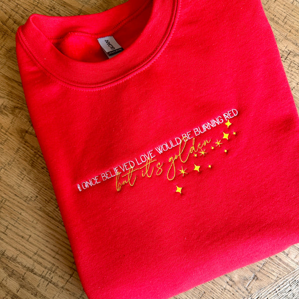 But It's Golden on Red Heavy Blend Sweatshirt