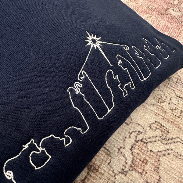 Nativity Outline on Navy Gildan Heavy Blend Sweatshirt